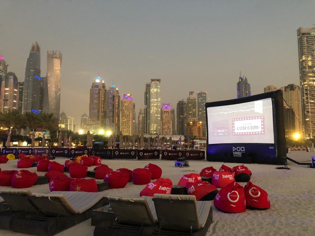 Discover the magic of outdoor cinema at the stunning waterfront Promenade at Manar Mall
